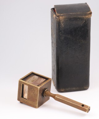 A prismatic brass Winkelspiegel 8cm x 2.5m x 2.5cm, with fitted leather case