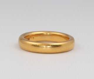 A 22ct yellow gold wedding band size I, 6.6 grams 