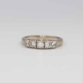 An 18ct yellow gold 5 stone diamond ring, approx. 0.5ct, size N 1/2, 5.1 grams