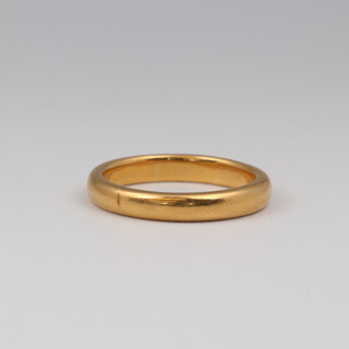 A yellow gold, testing as 18ct diamond wedding band, size P 1/2, 6.7 grams 