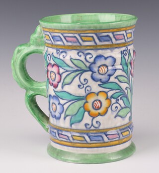 A Charlotte Rhead Caliph pattern jug decorated with flowers numbered 5411, printed mark and signature 19cm 