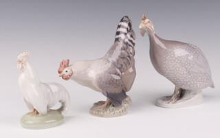 A Royal Copenhagen figure of a cockerel 1024 15cm, ditto 1126 11cm and a grouse 1086 15cm 
