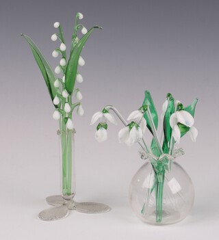 A Continental glass vase with glass snow drops 11cm, together with a specimen vase with Lily of The Valley flowers 16cm 