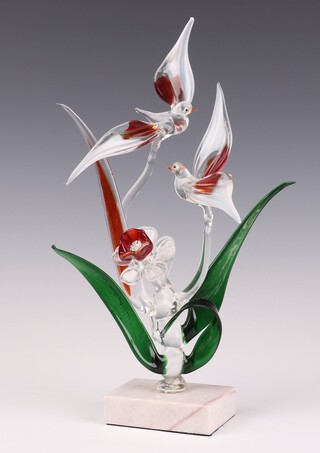 A Continental coloured glass group of birds amongst flowers on a marble base 28cm 