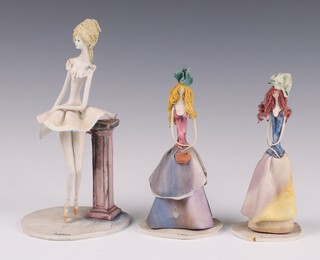 Three Lo Scricciolo mid-century studio ceramic figures of a lady signed G Duso 14cm, ditto signed 14cm and a ballet dancer 19cm 