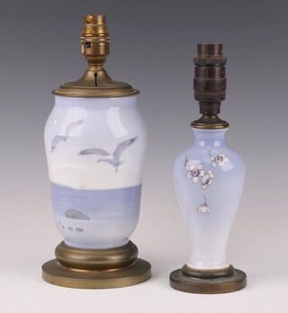 A Royal Copenhagen vase decorated with seagulls 30cm together with a ditto decorated with flowers 24cm both drilled and converted electricity