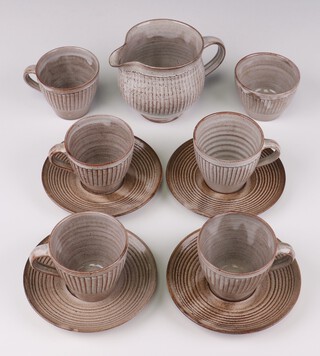David Leach (1911-2005), a Studio Pottery part tea set comprising 5 tea cups, 4 saucers, sugar bowl and milk jug