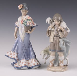 A Lladro figure Flora Maria 5490 24cm and a boy shepherd 5495 23cm 