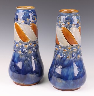 A pair of Royal Doulton bulbous vases with extended necks and geometric decoration, 36cm 
