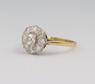 An 18ct yellow gold diamond cluster ring, approx. 0.75ct, size L 1/2, 2.7 grams