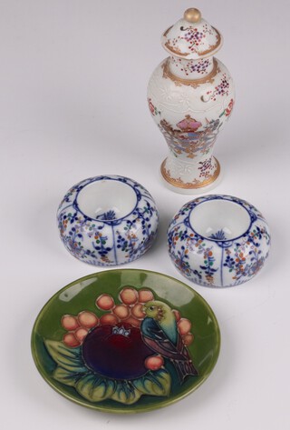 A 19th Century Samson oviform vase and cover decorated with an armorial and flowers 15cm (chips to lid), together with a pair of Dutch circular salts and a contemporary Moorcroft dish decorated with a bird amongst fruits 12cm  