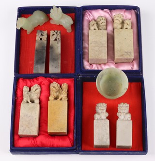 Two pairs of modern soapstone seals with shi shi finials, a reclining horse (a/f), a standing shi shi and a beaker 