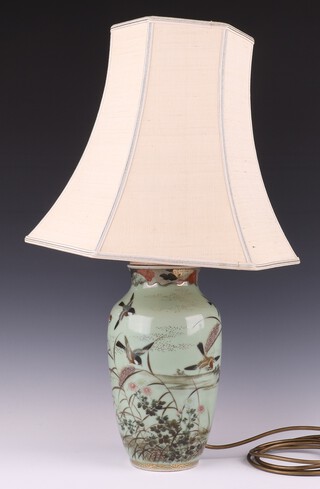 A Japanese Celadon oviform vase decorated with exotic birds amongst flowers 29cm, drilled and converted to electricity 