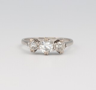 An 18ct white gold 3 stone diamond ring, approx. 0.9ct, size K 1/2, 2.9 grams, colour H/J, clarity SI1 
