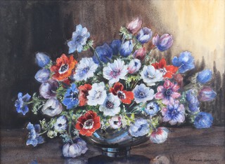 ** Marion Broom (British, 1878-1962) A pair of Still Life with Flowers, watercolour, signed, 54cm x 75cm, within a composition frame **Please note that Artist's Resale Rights may be payable on this lot	