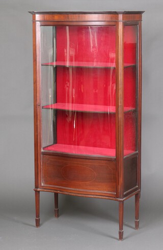 An Edwardian inlaid mahogany display cabinet, raised on square tapered supports 172cm h x 81cm w x 38cm d 