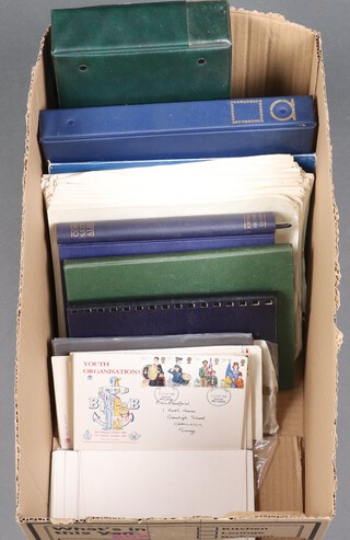 A ring bound album of GB stamps, loose sheets of world stamps and a collection of Wills and Ogdens cigarette cards