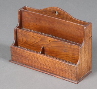 A 1920's arch shaped 3 division stationery rack 22cm h x 29cm w x 11cm d 