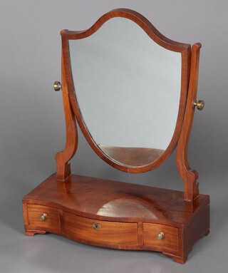 A Hepplewhite style shield shaped bevelled plate dressing table mirror contained in a mahogany swing frame, the base fitted 3 drawers 57cm h x 45cm w x 21cm d  