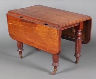 A Victorian mahogany drop flap dining table raised on turned and reeded supports 74cm h x 102cm w x 69cm d