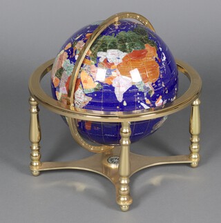 A Franklin Mint terrestrial globe, set semi precious hardstones, in a gilt metal gimbled mount 44cm h 