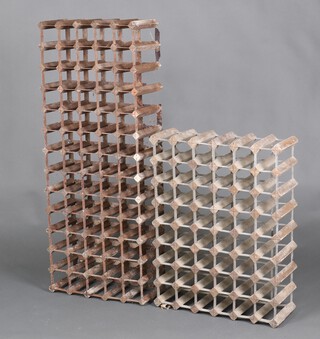 A wooden and metal 65 bottle wine rack together with a ditto 48 bottle wine rack