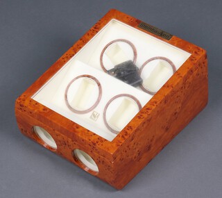 A Steinhausen quad watch winder with walnut effect display case