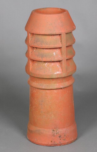 A circular terracotta louvred chimney pot 77cm h x 32cm d