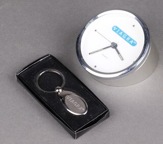 A novelty Viagra quartz timepiece and a ditto key fob