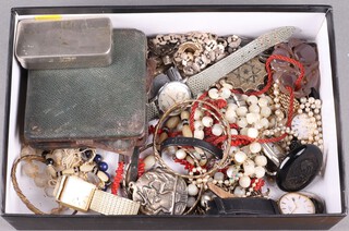 A quantity of various costume jewellery, wrist watches and a travelling clock