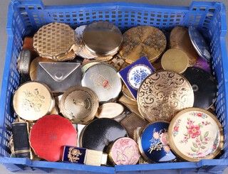 A collection of various compacts and pill boxes