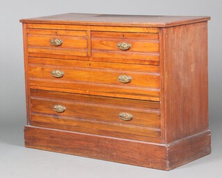 An Edwardian walnut dressing chest, raised on an oval platform base 81cm h x 107cm w x 48cm d (top has holes)