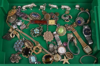 A quantity of vintage costume jewellery and wristwatches including metal figures of animals
