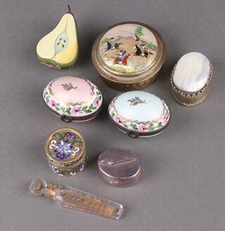 A British Airways silver pill box, an eastern brass trinket box decorated a hunting scene, a gilded glass scent, two egg shaped porcelain pill boxes and other boxes