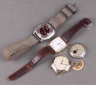A gentleman's steel cased Seiko calendar wristwatch on a cloth strap, a gilt cased Rotary calendar wristwatch and 2 other wristwatches 