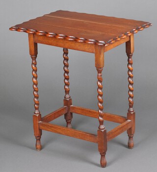 A 1930's rectangular oak occasional table with pie crust edge, raised on spiral turned supports 70cm h x 60cm w x 45cm d  