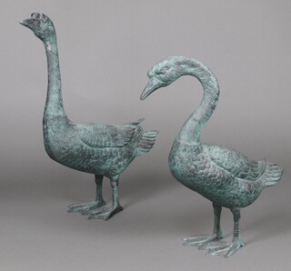 A pair of bronzed figures of geese 70cm h 