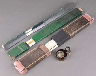 A prismatic compass and various slide rules