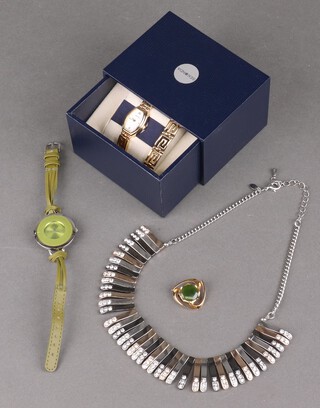 A Lady's Sekonda wristwatch, boxed, one other wristwatch, a paste necklace and a brooch