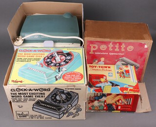 A collection of vintage games to include Clock-A-Word, Show and Tell Phono Viewer (failed an electrical PAT test and would require rewiring, to be sold for decorative purposes only), Toy-Town Telephone Exchange etc