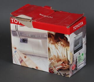 A Toyota Model ESS224 sewing machine, boxed (not guaranteed to work) 