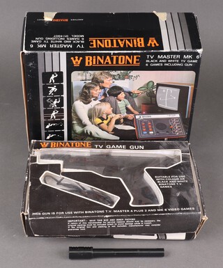A boxed Binatone TV Master MK6 games console and associated TV game gun 