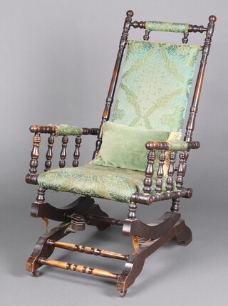 An American turned and ebonised rocking chair 97cm h 