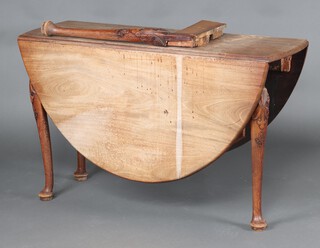 A 19th Century bleached mahogany oval drop flap dining table on club supports 73cm h (frame loose)