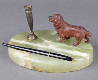 An onyx pen stand decorated a figure of a spaniel