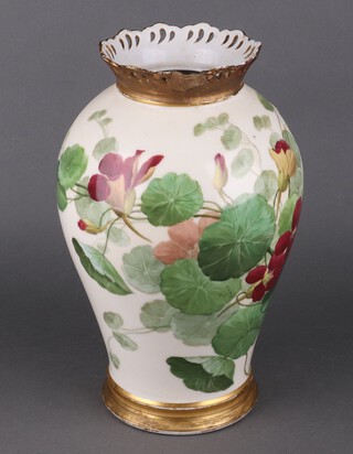 A pottery vase with pierced gilded rim decorated flowers