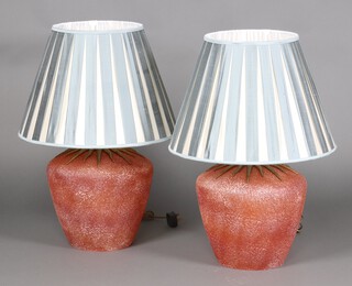 A pair of 20th Century orange glass table lamps with gilt mounts 27cm x 31cm 