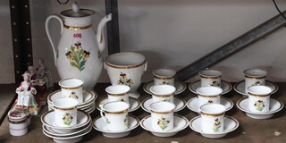 Three 19th century pottery fairings, 2 porcelain trinket boxes and a gilt banded part tea service with floral decoration