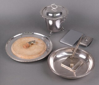 A silver plated and wooden bread board, a silver plated lidded ice bucket and other items of silver plate