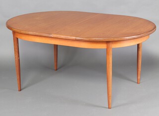 G-Plan, a 1980's extending teak dining table (table leaves are unattached)  76cm h x 153cm l x 110cm w 